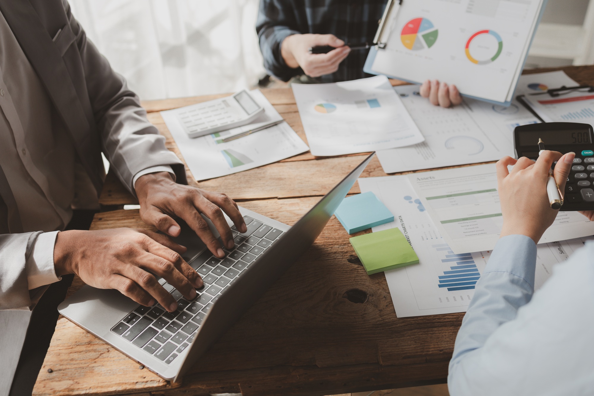 They are calculating the taxes they have to pay, Numerical data is being presented for the accountan